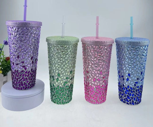 Set of four colorful stylish water tumblers with straw featuring textured leaf pattern design