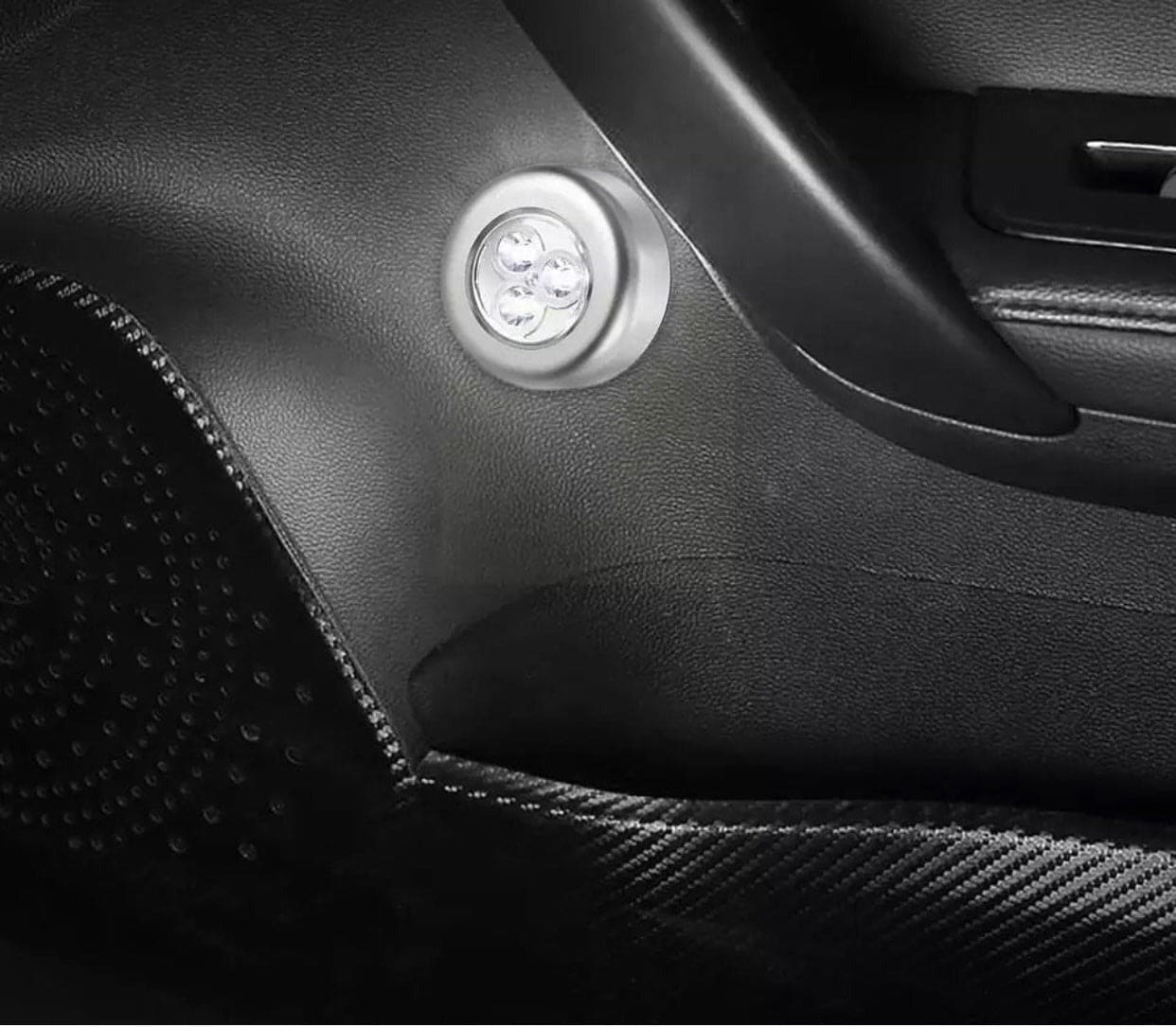 Clarify.pk touch type car reading light installed on black car interior near door handle