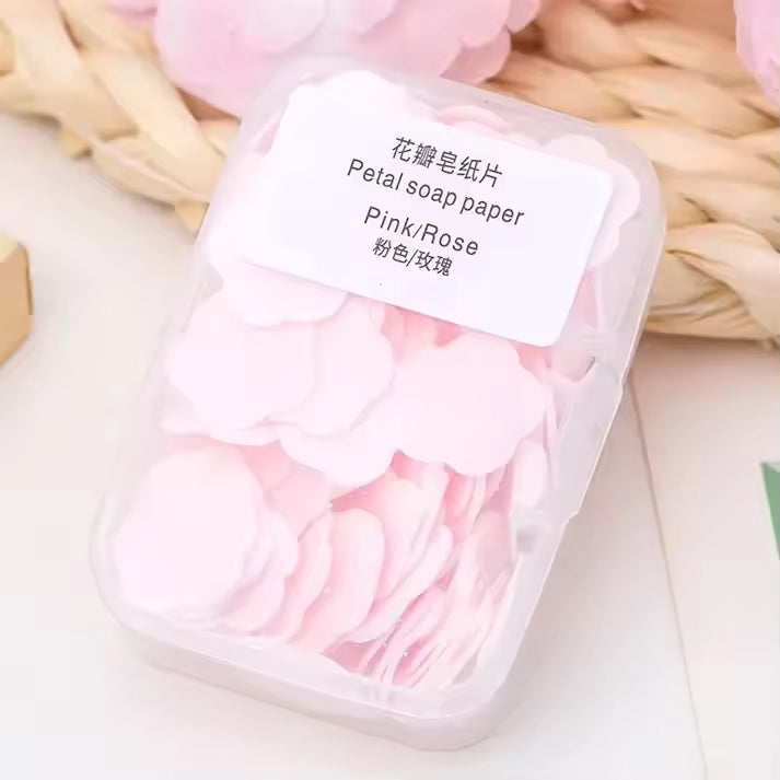 Clarify.pk pink rose petal shaped travel soap paper sheets in clear plastic container