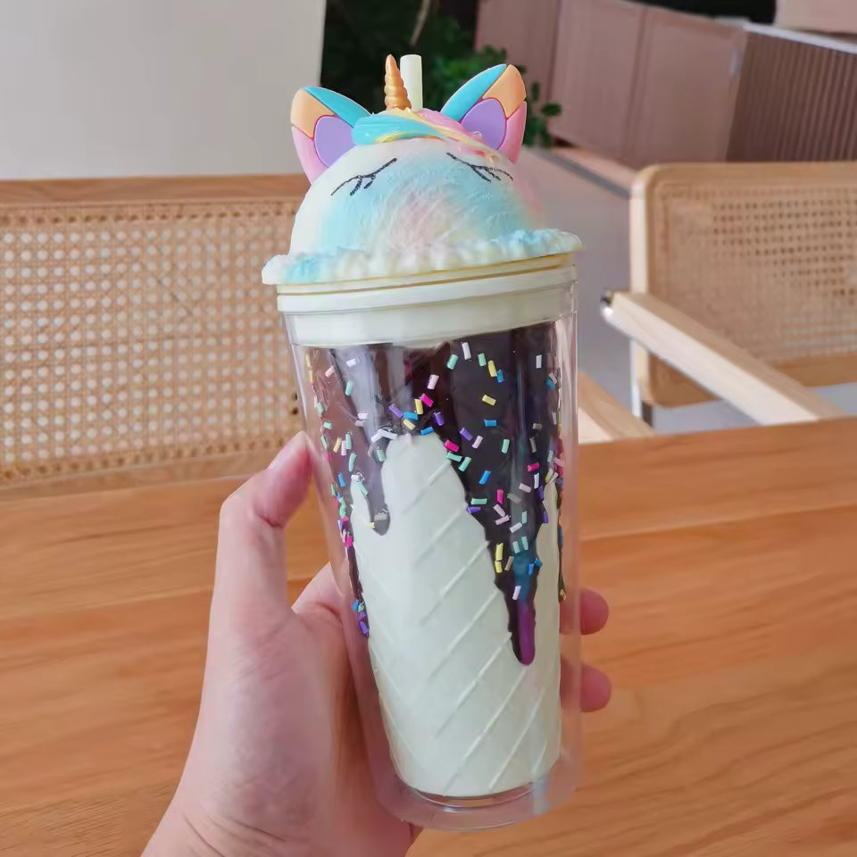 Unicorn water cup with straw featuring a colorful unicorn lid and sprinkles design