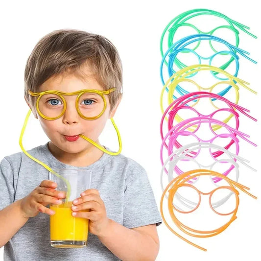 Child drinking orange juice using unique drinking straws shaped as colorful glasses by Clarify.pk