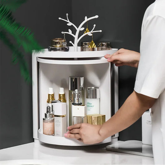 Clarify.pk 360 rotating bathroom organizer holding skincare bottles and jars on white countertop