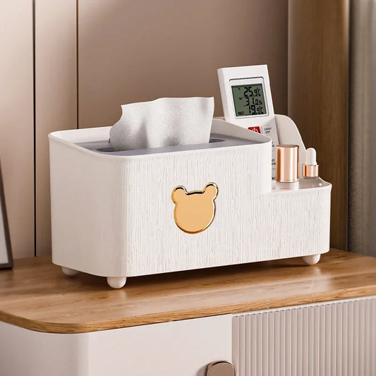 Cartoon bear tissue box organizer in white with gold bear emblem and side compartments for remote and cosmetics