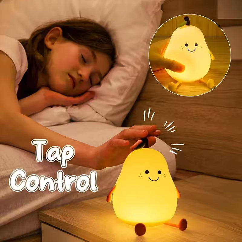 Cute pear night light by Clarify.pk glowing on bedside table next to a sleeping child