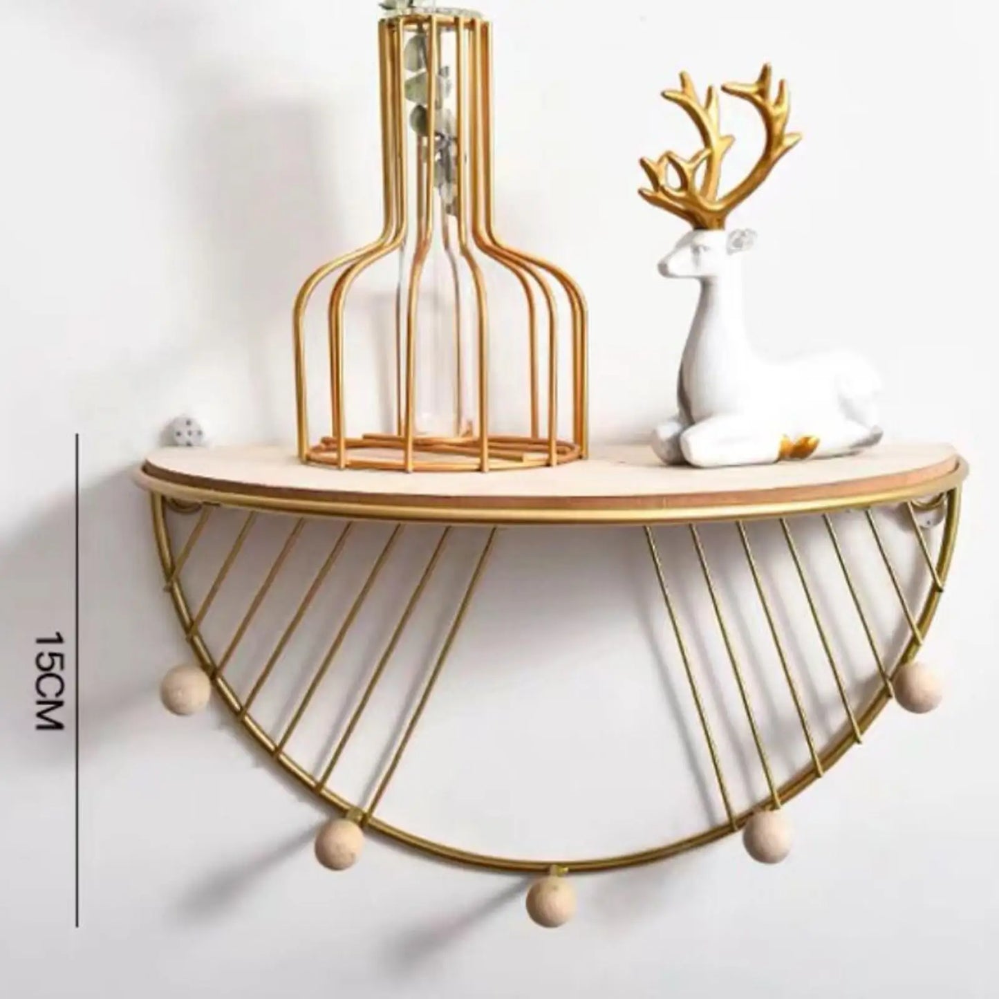 Decorative floating wall shelf for decor with wooden top and gold metal frame holding vase and deer ornament