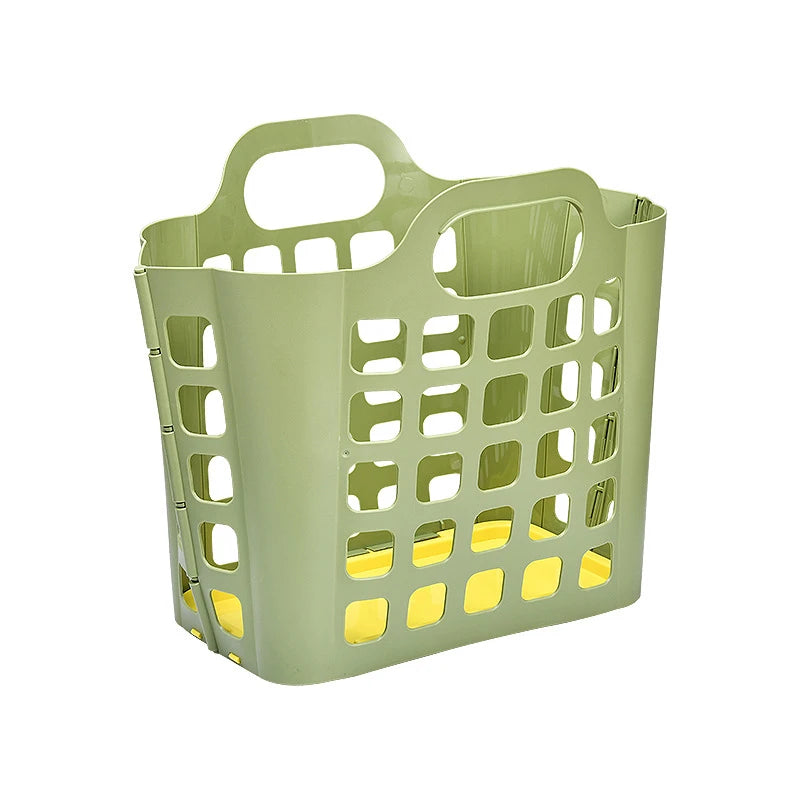 Green foldable plastic laundry basket with handles and square ventilation holes by Clarify.pk