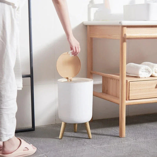 Clarify.pk modern wooden dustbin paper basket with lid and wooden legs in bathroom setting