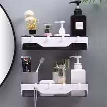 Clarify.pk wall-mounted bathroom shelf holding toiletries and accessories in a modern bathroom setup