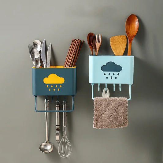 Wall mounted kitchen organizer with utensil holders and hooks for spoons, chopsticks, and towels