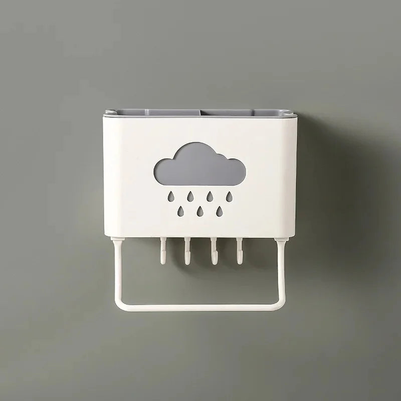 White wall mounted kitchen organizer with cloud and raindrop design hooks for hanging utensils