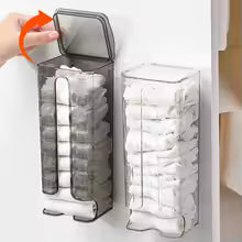 Wall mounted sock organizer holding neatly folded white socks with easy flip-top lid access
