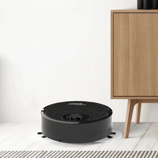 Black wireless sweeping and mopping robot operating on a white floor next to wooden furniture