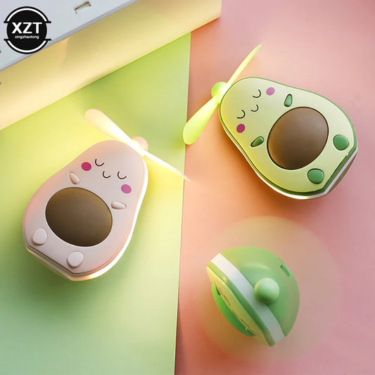 Cute avocado shaped portable makeup mirror fan in green and white colors with soft light