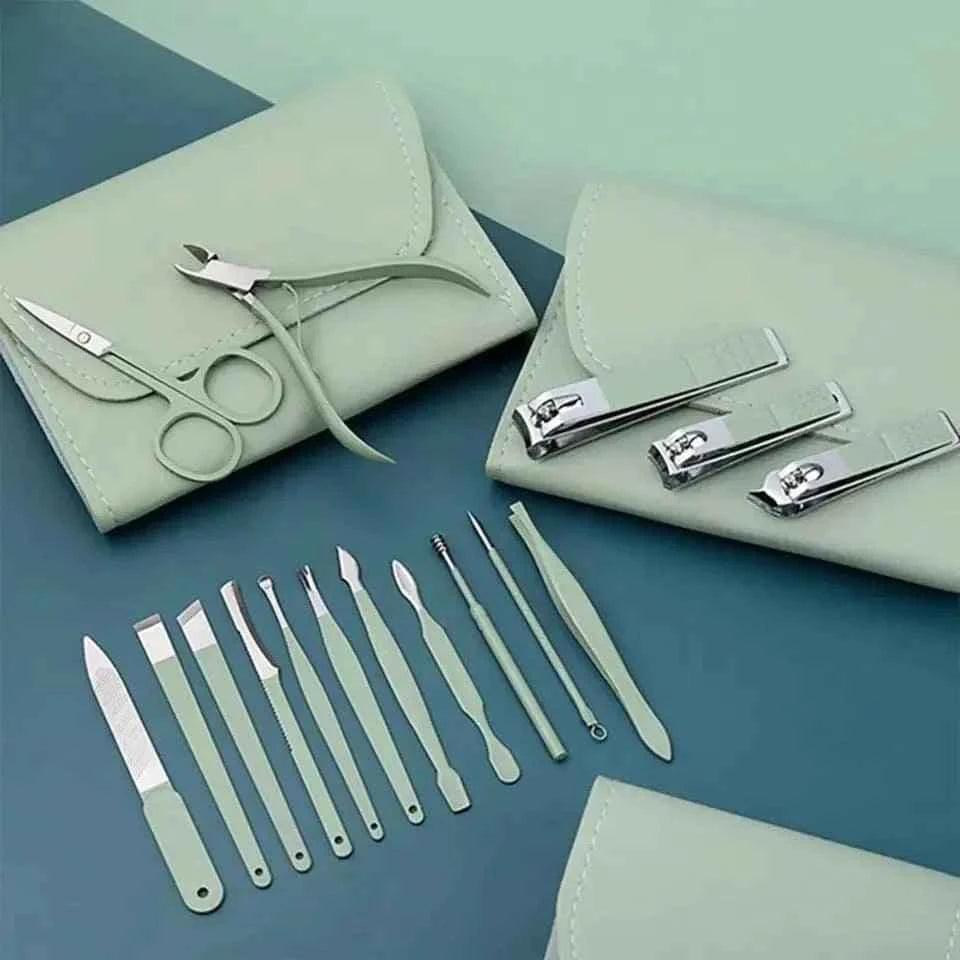 16-piece manicure pedicure set with stainless steel tools and mint green carrying pouches