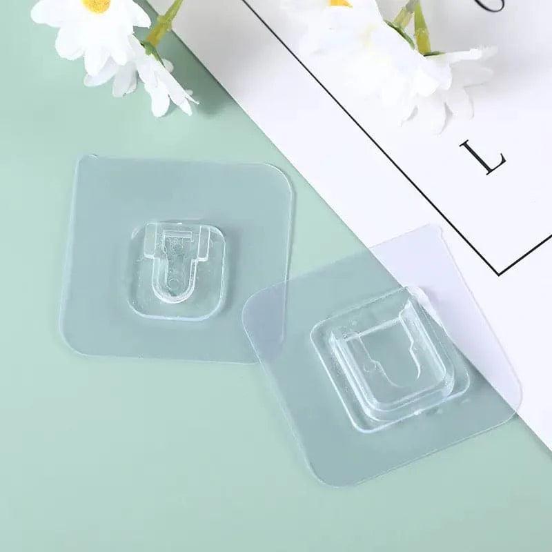 Pack of 4 Transparent Adhesive Wall Hooks, Double-Sided Mounts for Easy Installation - Clarify.pk