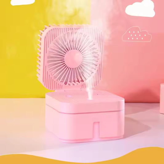 Pink 2-in-1 humidifier cooling fan with compact design releasing mist on colorful background