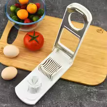 2 in 1 multifunctional kitchen tool with slicing blade and egg holder on wooden cutting board