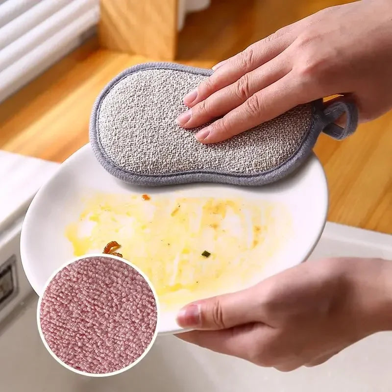 2 pieces double sided kitchen cleaning sponges by Clarify.pk cleaning food residue from white plate