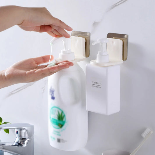 Clarify.pk 2 pieces wall mounted shampoo holder with white bottles dispensing liquid in bathroom