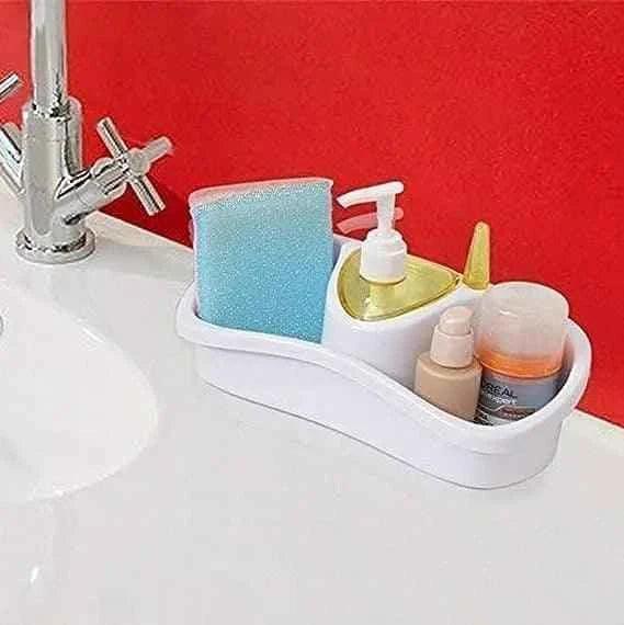 Clarify 3 in 1 dish soap dispenser with sponge holder and multiple compartments on sink countertop