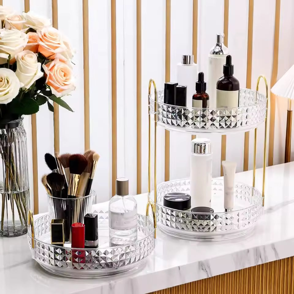 Elegant 3 layer cosmetic organizer rack with clear trays and gold frame holding makeup and skincare products