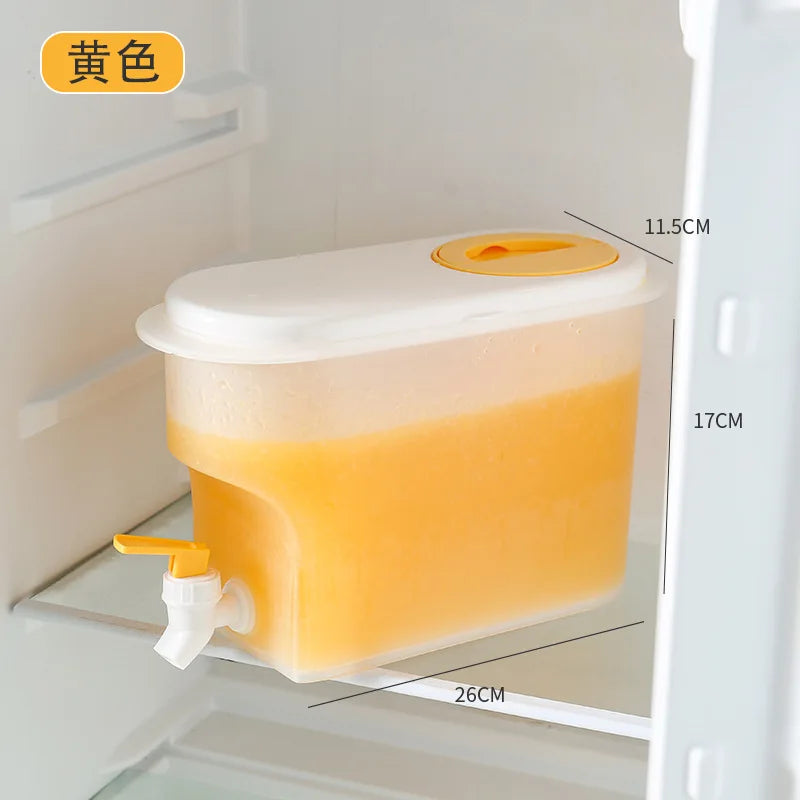 3.5l refrigerator water dispenser with white lid and yellow spout filled with orange juice inside fridge
