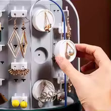 Clarify.pk 360 rotating jewelry organizer storing earrings and necklaces with easy access