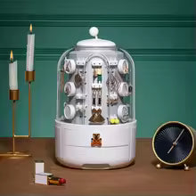 Clarify.pk 360 rotating jewelry organizer with multiple compartments and white base for elegant storage