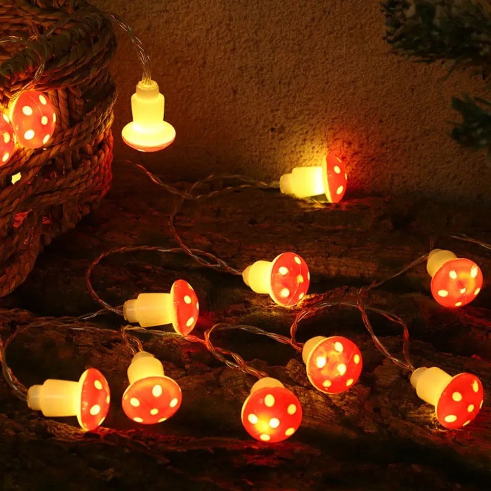 Clarify.pk 3D mushroom string lights glowing warm orange with white spots for cozy decoration