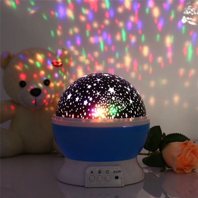 Clarify.pk 3D night light projector with starry sky pattern projecting colorful lights on wall