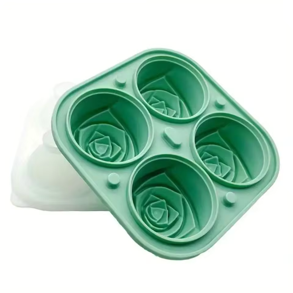 Green silicone 3D rose ice cube molds with four round cavities for detailed ice shapes