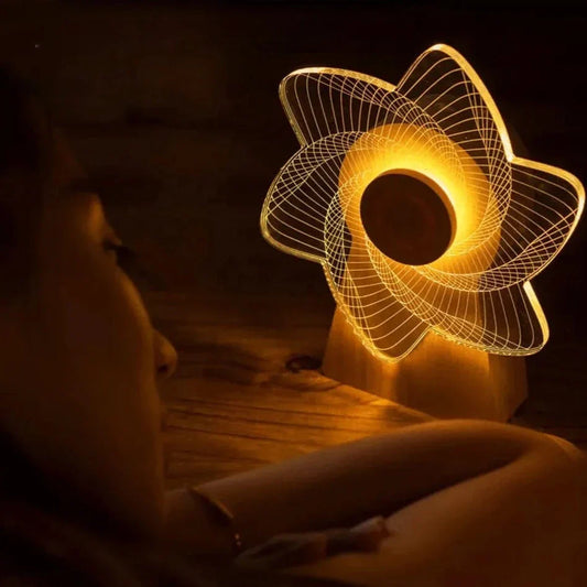 Clarify.pk 3D windmill night light lamp glowing warmly beside a person in a dark room