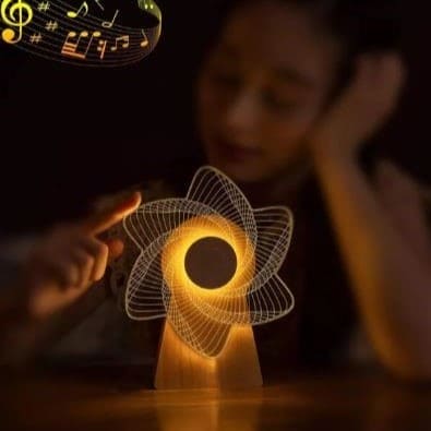 Clarify.pk 3D windmill night light lamp glowing warmly on wooden base with music notes in background