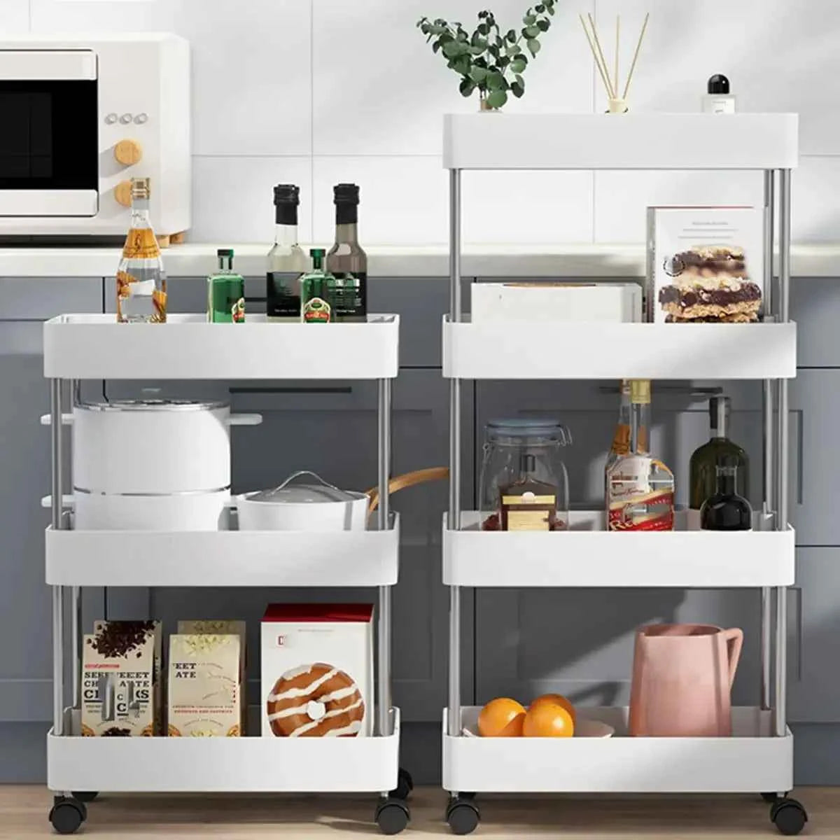 4 tier slide organizer shelf in white with wheels for kitchen storage and easy access