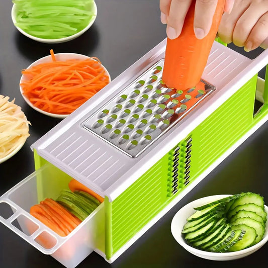 Clarify.pk 5-in-1 kitchen slicer for vegetables in green slicing carrot with sliced cucumbers and carrots
