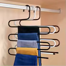 Clarify.pk 5 in 1 pants hanger organizer in black holding multiple pairs of pants on closet rod