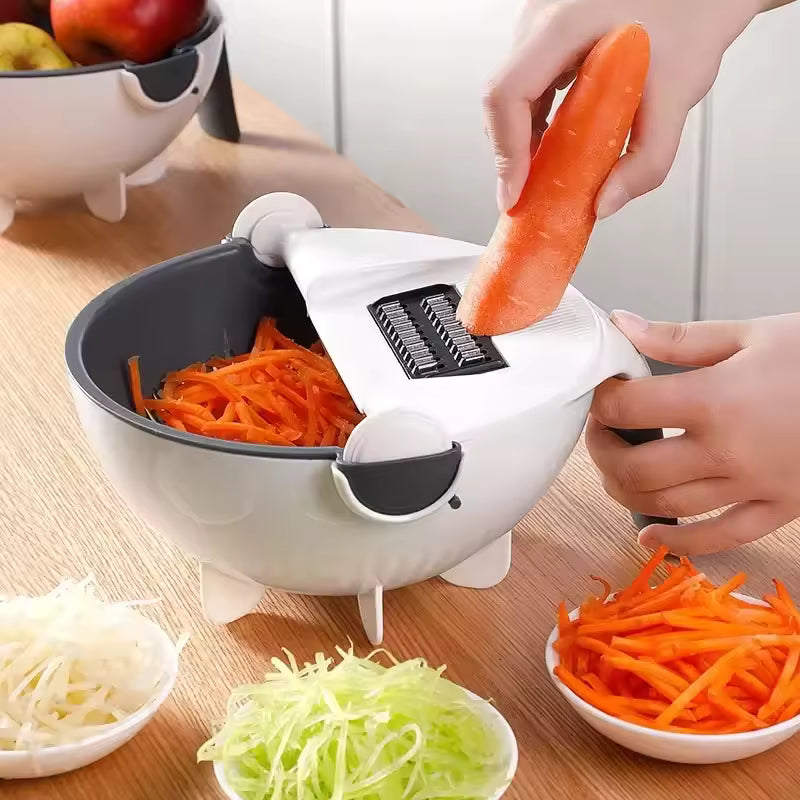 Clarify.pk 6 in 1 kitchen chopper and grater slicing carrot with multiple vegetable shreds collected in bowl