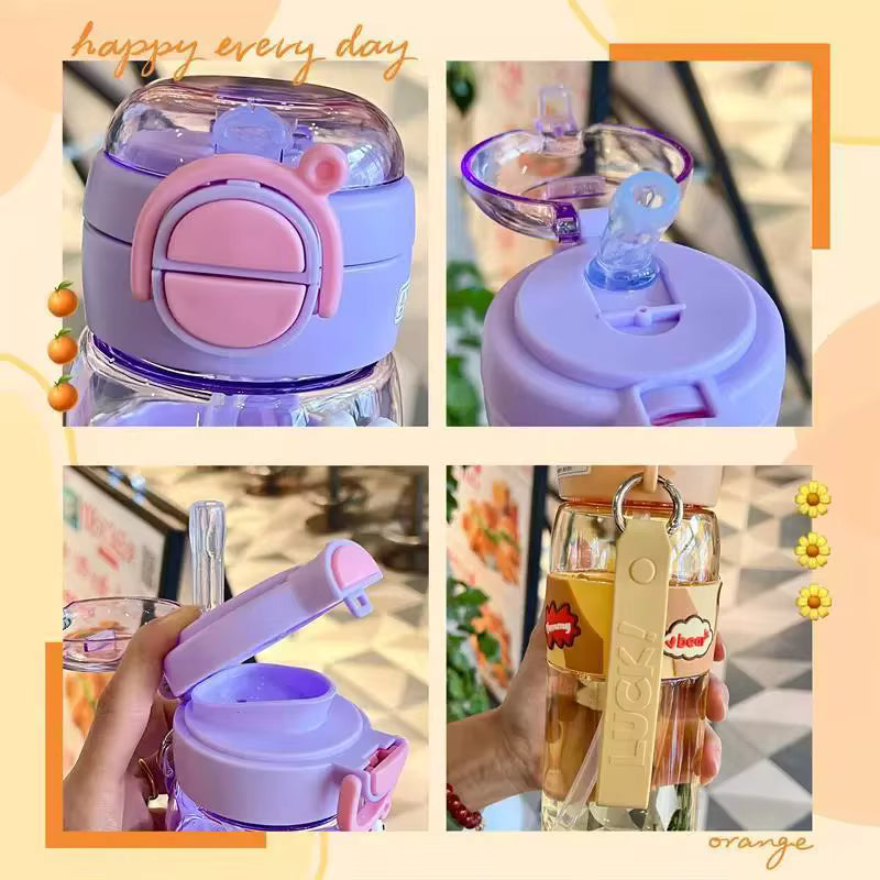 600ml kids water bottle with straw in purple and pink with flip lid and carrying strap by Clarify.pk