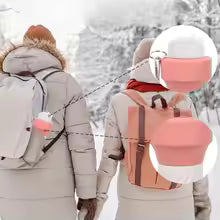 650ml silicone sports water bottle hanging on backpacks of two people walking in snowy outdoor setting