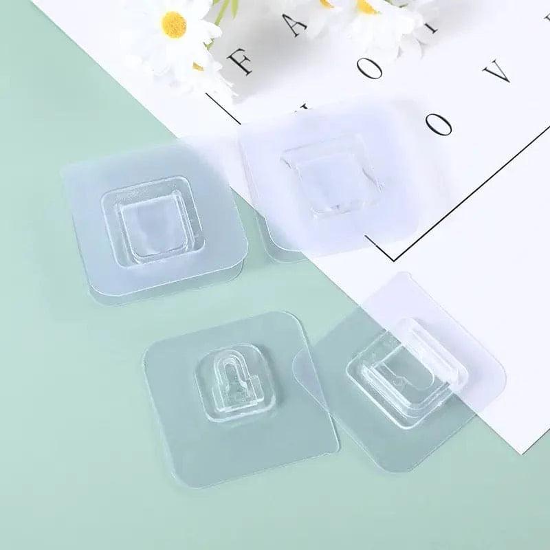 Pack of 4 Transparent Adhesive Wall Hooks, Double-Sided Mounts for Easy Installation - Clarify.pk