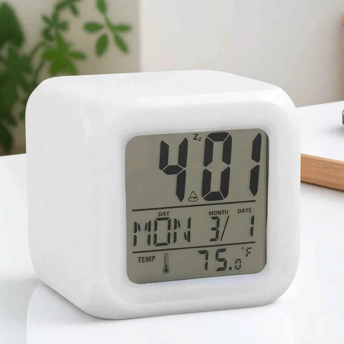 White digital 7 color LED alarm clock displaying time and temperature for easy visibility
