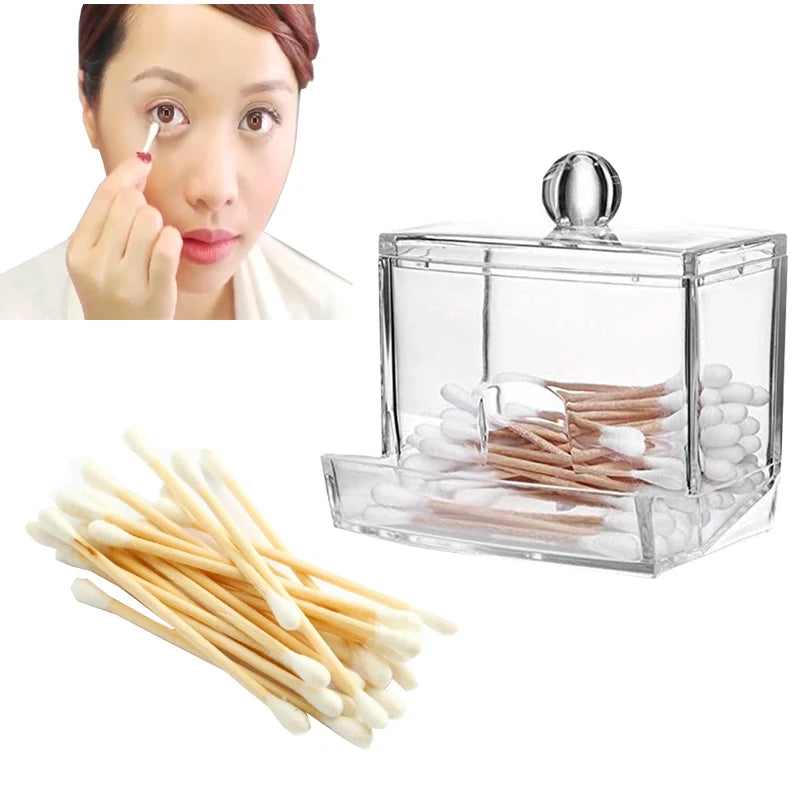 Clear acrylic cotton swab storage box holding cotton swabs with woman using a cotton swab