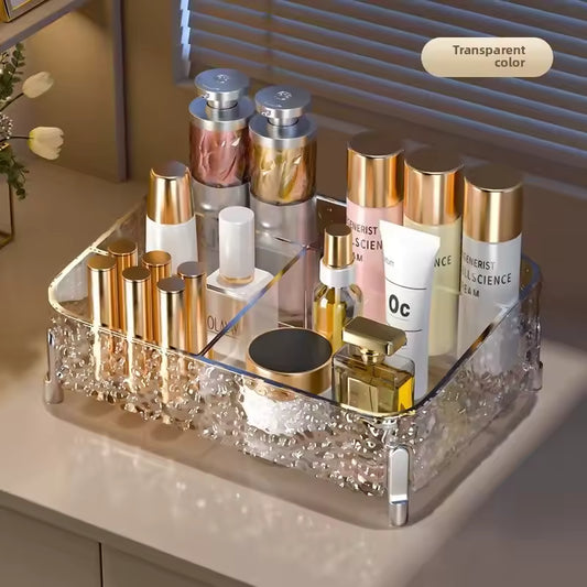 Clarify.pk transparent acrylic makeup organizer box holding skincare and cosmetic bottles with gold caps