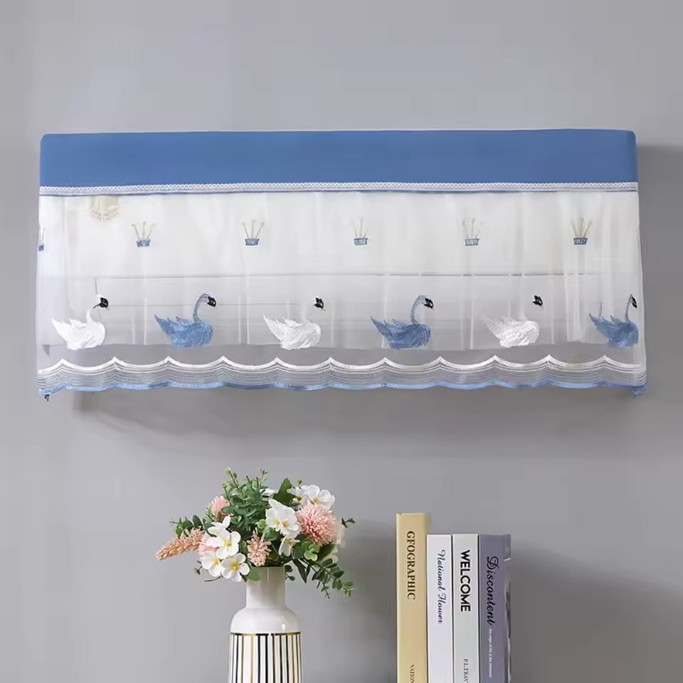 Clarify.pk air conditioner dust cover with blue and white swan design protecting the unit