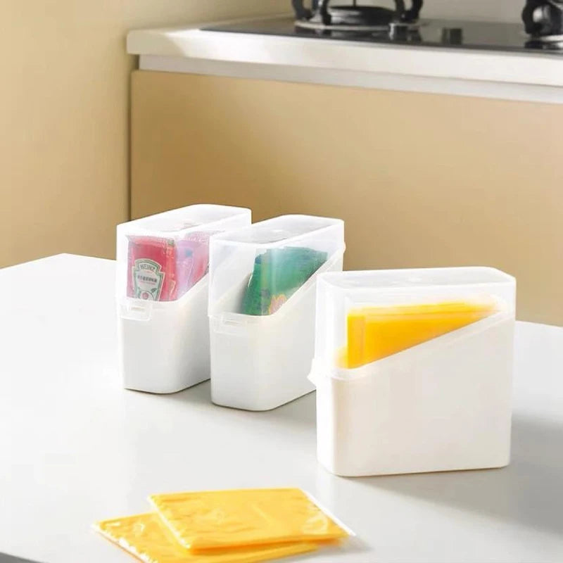 Airtight cheese storage container set with white base and clear lids keeping cheese slices fresh on kitchen counter
