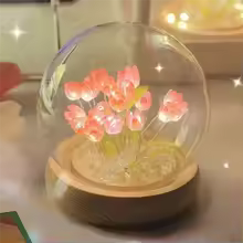 Clarify.pk artificial tulip night lamp with glowing pink flowers inside a clear glass globe on wooden base