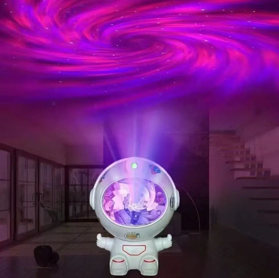 Clarify.pk astronaut star projector lamp projecting colorful galaxy lights on ceiling