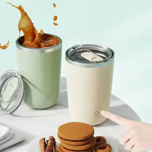 Clarify.pk automatic self stirring mug in cream and green with splash of coffee and transparent lids