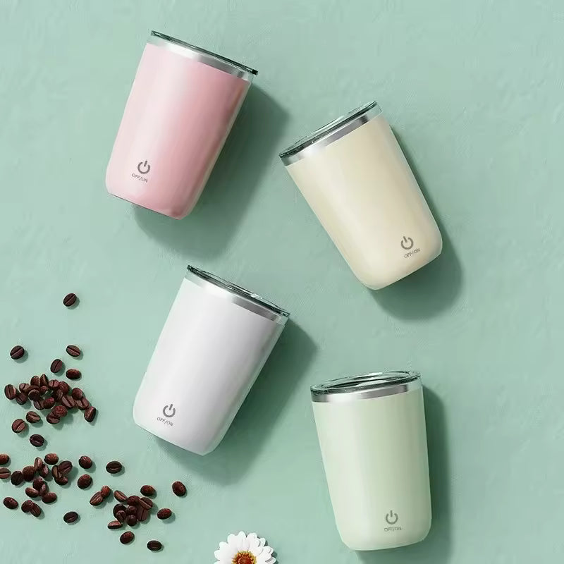 Clarify.pk automatic self stirring mug set in pink cream white and green with clear lids on green background