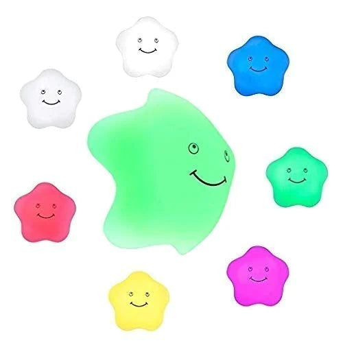 Colorful smiling baby night light silicone stars and a moon-shaped light in green